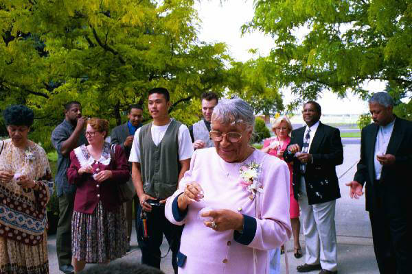 Visitors blow bubbles outside the chapel