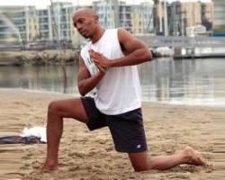 yoga-man-on-beach.jpg